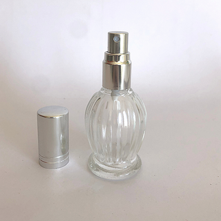 Empty perfume bottle for DIYs with essential oils with a white  background