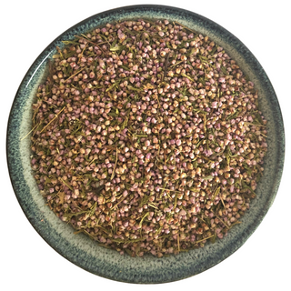A bowl of dried heather flowers