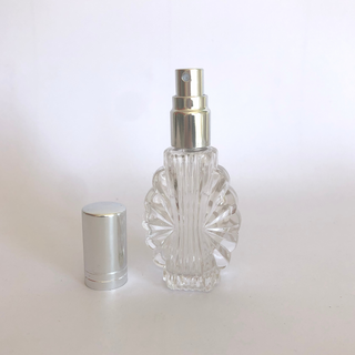 empty perfume bottle with white background