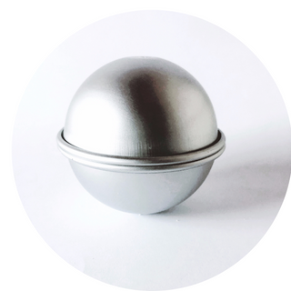 Two aluminium bath bomb spheres are joined together